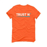 Nike Dunk Low “Miami Dolphins” | illcurrency Orange T-Shirt (TRUST NO ONE)